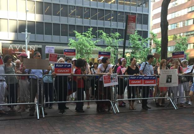 Members of Indivisible chapters at a July 18 outside the offices of Senators Chuck Schumer and Kirsten Gillibrand's offices. The rally was in opposition of Senate bills that would have undone the Affordable Care Act. Photo: Bryse Ayn Ciallella 