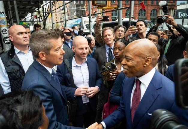 Mayor Eric Adams shakes hands with the Transportation Secretary Sean Duffy before embarking on a two stop subway “tour” on the B Line on April 4. Duffy, who had earlier called the subway system a “shithole” apparently did not change his tune after the ride with hizzoner.