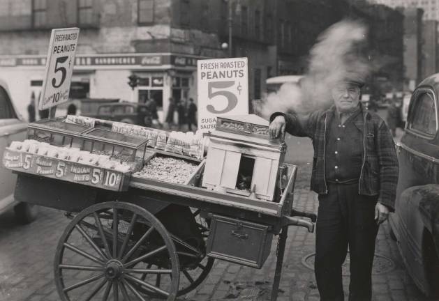 Todd Webb, The Battery, New York (Peanut Peddler), 1945. Courtesy Museum of the City of New York and the Todd Webb Estate.