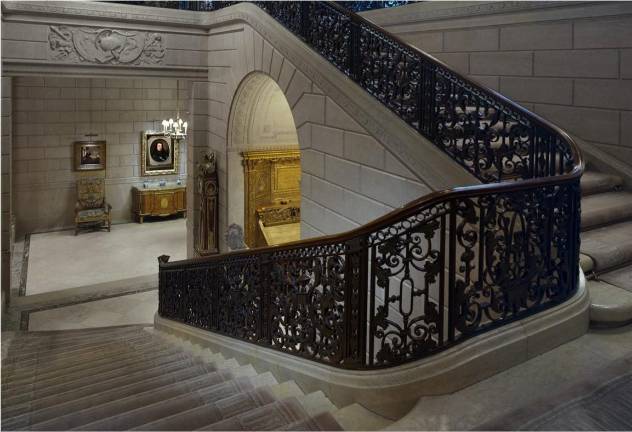The grand staircase inside the Frick Collection. The $220 million renovation completed in April 2025 contains a 220 seat auditorium.