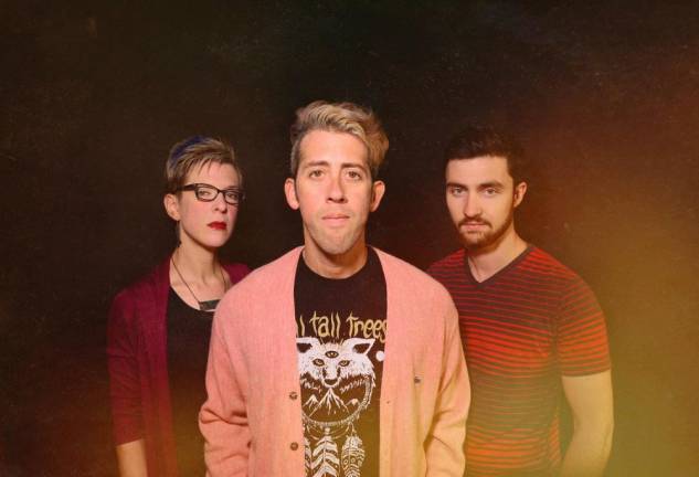 Joe Brent (center) with 9 Horses bandmates Sara Caswell (left) and Andrew Ryan (right)