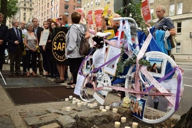 Street safety advocates gathered last fall to dedicate a “ghost bike” in memory of Madison Jane Lyden, a cyclist who was struck and killed on Central Park West near 67th Street. Photo: Michael Garofalo