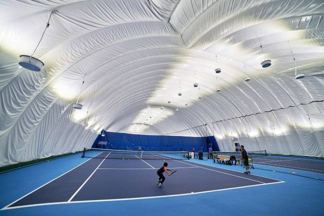The Tennis Club of Riverdale has a special “tennis bubble” — a spot where students learn the game. Photo courtesy of TCR