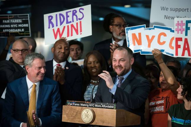 City Council Speaker Corey Johnson (right) celebrated the inclusion of a transit subsidy for low-income New Yorkers in the city budget June 12 with Mayor Bill de Blasio at the Fulton Street subway station. Photo: Ed Reed/Mayoral Photography Office