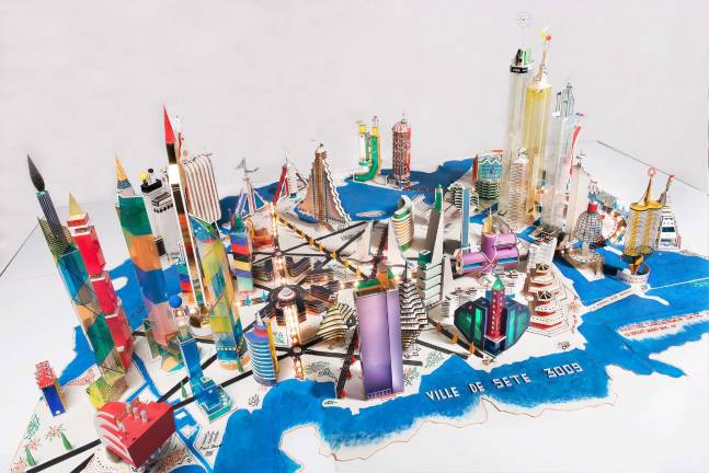 Bodys Isek Kingelez (Congolese, 1948-2015). "Ville de S&egrave;te 3009." 2000. Paper, paperboard, plastic, and other various materials, 31 1/2 &times; 9' 10 1/8? &times; 6' 10 11/16?. Collection Mus&eacute;e International des Arts Modestes (MIAM), S&egrave;te, France. &Copy; Pierre Schwartz ADAGP; courtesy Mus&eacute;e International des Arts Modestes (MIAM), S&egrave;te, France