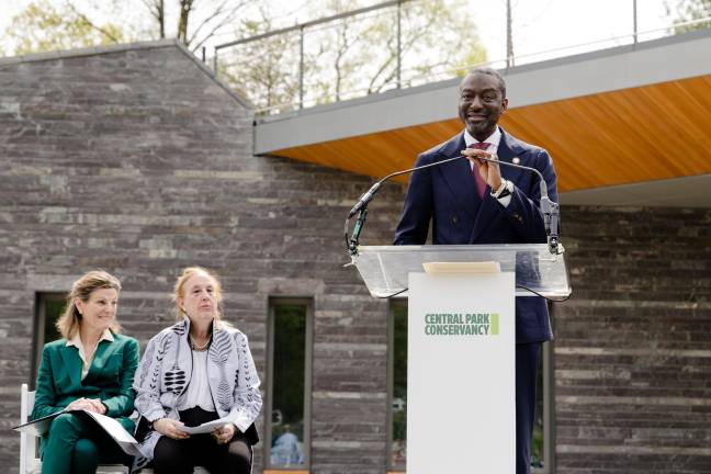 City Council Member Yusuf Salaam (speaking), a member of the exonerated Central Park Five who now represents Harlem, said that the opening of the Davis Center represents a “healing” for his community. From left: Central Park Conservancy CEO Betsy Smith and City Council Member Gale Brewer.