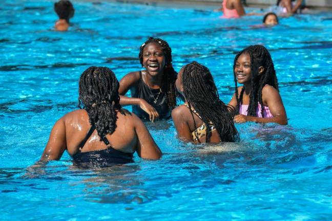 A group of kids enjoy a cooling dip in one of New York City’s public pools. Photo: NYC Parks / Daniel Avila