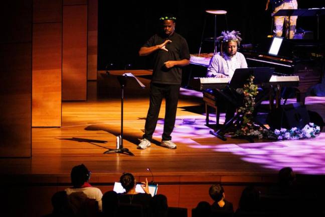 Zavier Sabio, a deaf American Sign Language interpreter and performer, signed alongside the musicians throughout the show. Photo: Sachyn Mital/ Lincoln Center