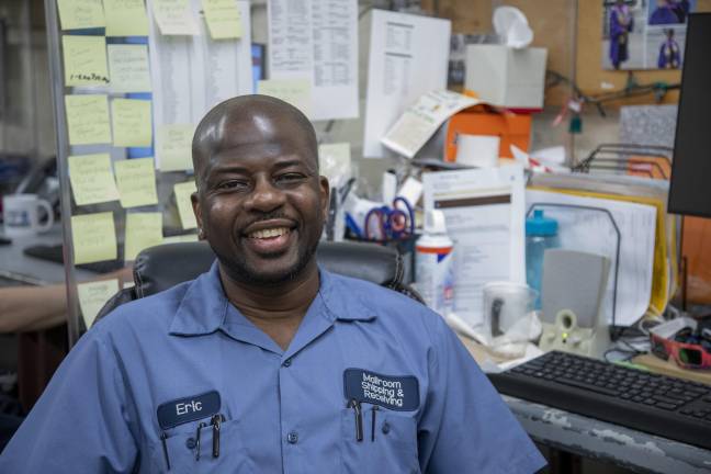 Eric Williams at his desk in the lower level mailroom, underneath some of the city’s most iconic exhibits. Here, he works with his colleagues to organize and sort all of the museum’s mail. (Photo: Martina Dimitrova)