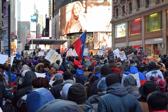 Protesters gathered in Times Square on Martin Luther King Jr. Day for an anti-racism rally following reports of President Donald Trump’s disparaging comments about Haiti and other countries. Photo: Michael Garofalo