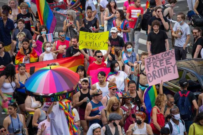 Signs supporting the end of Britney Spears's conservatorship at Pride 2021. Photo: Trish Rooney