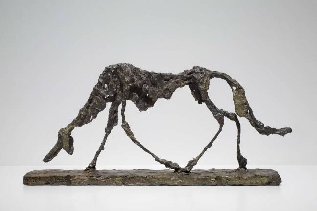 &#xa0;&quot;Dog&quot; (1951; cast 1957), one of four animal sculptures by Giacometti, is a melancholic self-portrait. Bronze, 44.2 x 96.8 x 15.7 cm. Hirshhorn Museum and Sculpture Garden, Smithsonian Institution, Washington, DC, Gift of Joseph H. Hirshhorn, 1966. &#xa9; 2018 Alberto Giacometti Estate/Licensed by VAGA and ARS, New York