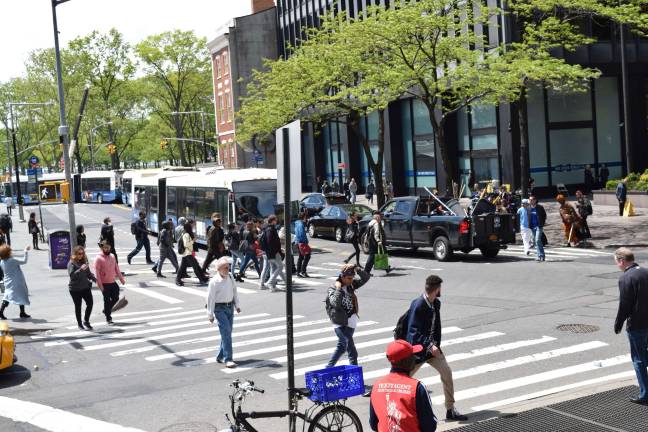 The intersection of Whitehall Street with State Street and Water Street in the Financial District includes an “exclusive pedestrian phase” signal that stops traffic for pedestrians in all directions. Photo: Michael Garofalo