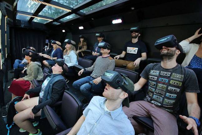 Passengers getting the fully immersive VR experience. Photo courtesy of The Downtown Experience