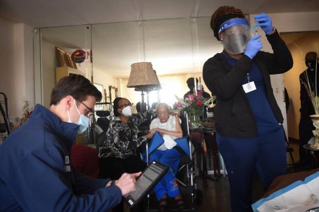 Sarah Butler, who just just turned 108 years old, receives the Johnson &amp; Johnson vaccine from the FDNY’s homebound vaccination program at her home in Harlem on Tuesday, April 6, 2021. Photo: Michael Appleton/Mayoral Photography Office