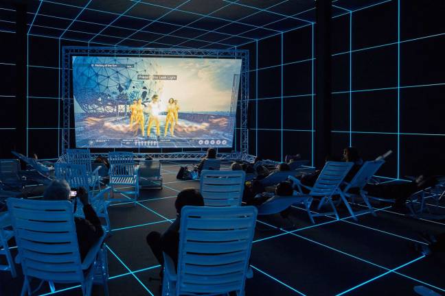 Hito Steyerl (b. 1966), Installation view of Factory of the Sun, 2015 (German Pavilion, 56th Venice Biennale, 2015). Video, color, sound; 21 min., looped; with environment, dimensions variable. Collection of the artist; courtesy Andrew Kreps Gallery, New York. Photograph by Manuel Reinartz; image courtesy the artist and Andrew Kreps Gallery, New York