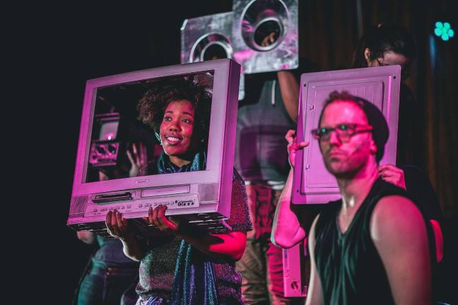 Nevin Denham, a basement rocker, and his ex-girlfriend and an astrophysicist, Amy Leonardo, might have the key to surviving the black hole coming down straight on earth. Photo: Zack Morrison