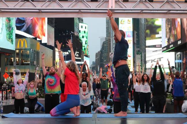 Celebrated yoga teachers Colleen Saidman-Yee and Rodney Yee led the 7:30 p.m. class. In 1999, Saidman-Yee opened Yoga Shanti in Sag Harbor, where the two have worked over the years. Photo: Zoey Lyttle