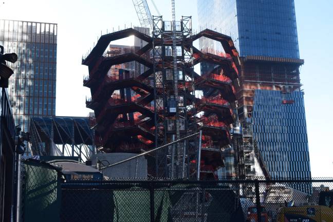 The English designer Thomas Heatherwick's “Vessel” structure will serve as the centerpiece of five acres of public plazas, gardens and groves at Hudson Yards. The steel installation recently topped out. Photo: Mihika Agarwal