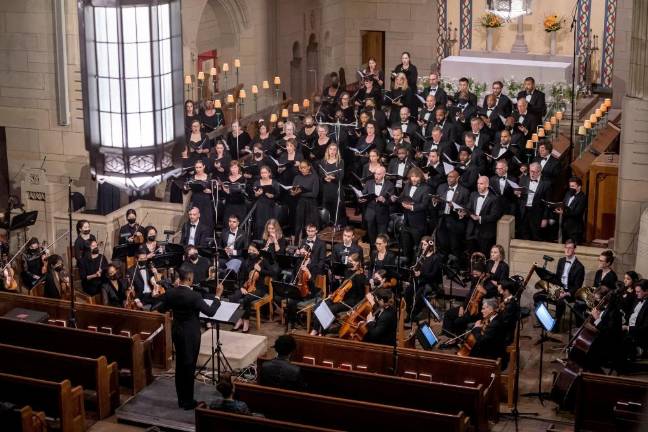 Malcolm J. Merriweather conducting The Dessoff Choirs. Photo: Stephanie Berger