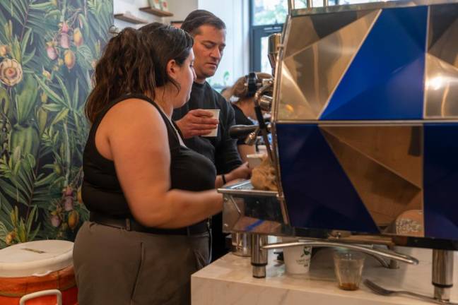 Community members who offered to volunteer as baristas to help support the cafe and keep it open on Nov. 8. (Priyanka Rajput)