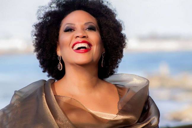 Adrienne Danrich’s solo show, “This Little Light of Mine: The Stories of Marian Anderson and Leontyne Price,” celebrates two African-American operatic pioneers. Photo courtesy Adrienne Danrich.
