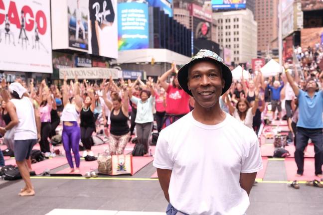 Douglass Steward observing Marco Rojas 1:30 p.m. class at Summer Solstice Yoga: Mind Over Madness event. Photo: Beau Matic