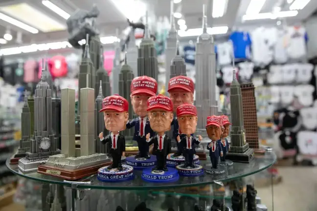 Donald Trump bobblehead dolls sit in a Little Italy gift shop, May 7, 2025.