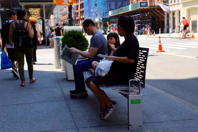 More than 500 CityBenches are expected to be in place by the end of next year. Photo: NYC DOT