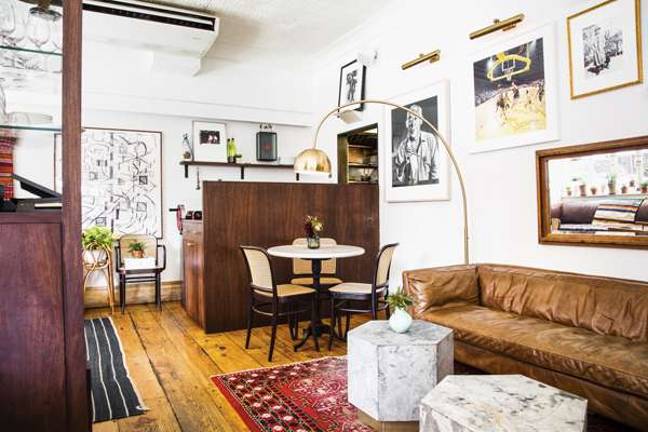 Fairfax features plush sofas, elegant tables and quaint display cases