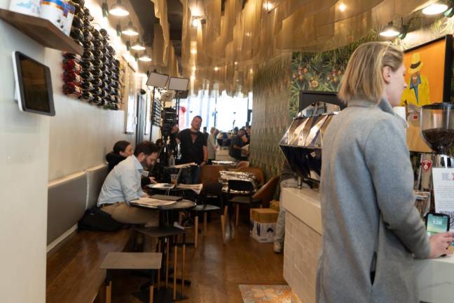 Inside Caffe Aronne, several tv journalists camped ‘in’ with their cameras and setup for interviews lined-up for later in the day. (Priyanka Rajput)