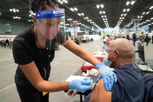 Administering the COVID vaccine at the Javits Center, January 13, 2021. Photo: Don Pollard/Office of Governor Andrew M. Cuomo