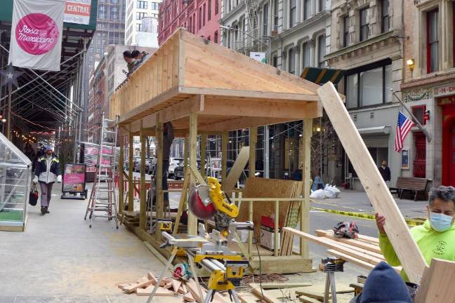 New outdoor dining structure going up on East 18th St., Feb. 12, 2022. Photo: Peter Burka, via Flickr