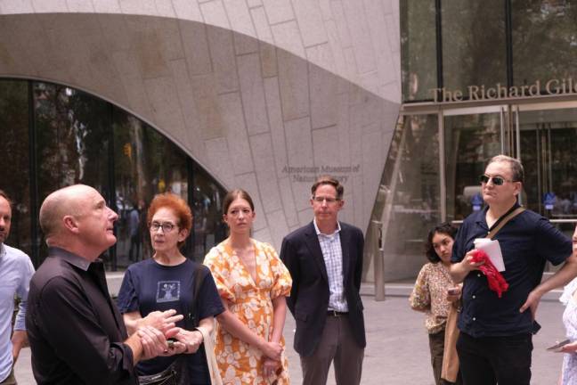 Doug Reed (left) speaking to press members about the landscaping structure of the park on the tour on Thursday, July 13 at 200 Central Park W. on the UWS. Photo: Beau Matic.