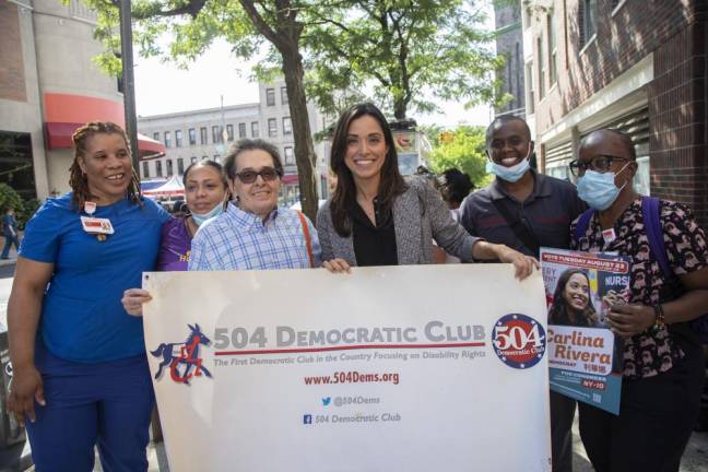 Carlina Rivera (center) campaigning. Photo courtesy of Carlina Rivera’s campaign