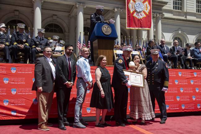 Lieutenant James M. Corey photographed while receiving the Firefighter Kevin C. Kane Medal during the 157th FDNY Medal Day Ceremony.