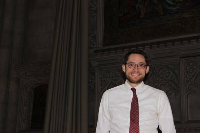 The Rev. Schuyler Vogel stands inside the Fourth Universalist Society at 76th Street and Central Park West. Photo: Razi Syed