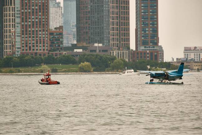 FDNY safely rescued eight passengers, the pilot and one crew member after a sea plane’s hard landing in the East River on July 5 caused a strut on the plane’s wing to snap. Following the accident the FDNY towed the plane to port.