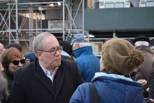 Comptroller Scott Stringer speaks with a constituent following Monday's press conference.