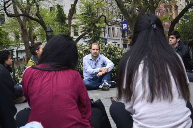 Iddo Tavory, an assistant professor of sociology at New York University, in Washington Square Park with his class of about 15 students during a May Day teach-out. Photo: Diamond Naga Siu