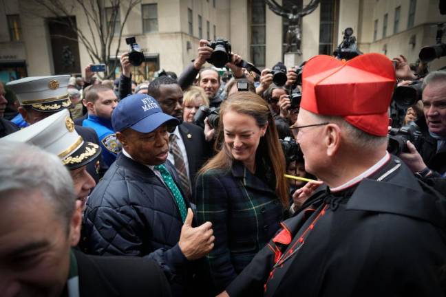Cardinal Timothy Dolan greets Mayor Eric Adams and FDNY Commissioner Laura Kavanagh on the steps of St. Patrick’s Cathedral at the 262nd Saint Patrick's Day Parade on 5th Avenue in Manhattan on Friday, March 17, 2023. Photo: Michael Appleton/Mayoral Photography Office
