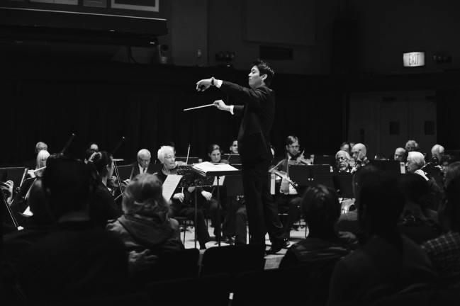 Music director Tomo Matsuo conducting the 92Y Orchestra. Photo: Ed Panganiban