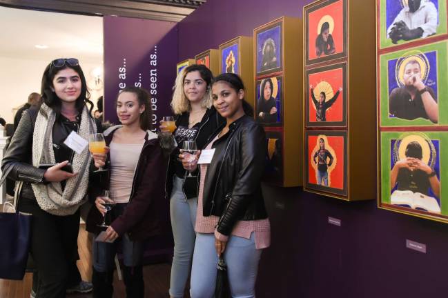 At the opening reception of "Pauli Murray: Imp, Crusader, Dude, Priest" at St. Paul's Chapel earlier this month, students from Leadership and Public Service High School stand next to triptychs inspired by the civil and women’s rights activist, professor, poet and priest that they created. Photo: Leah Reddy/Trinity Church Wall Street