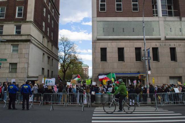 Protestors gather outside the gates of Columbia. (Photo: Andrew McDonald).