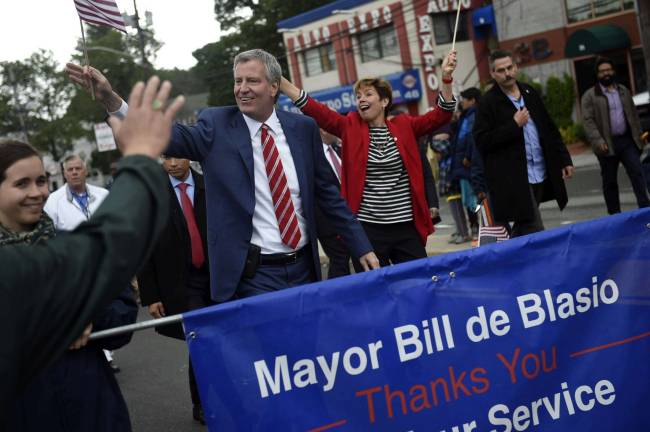 Mayor Bill de Blasio marches in the Little Neck Memorial Day Parade. Photo: Ed Reed/Mayoral Photography Office