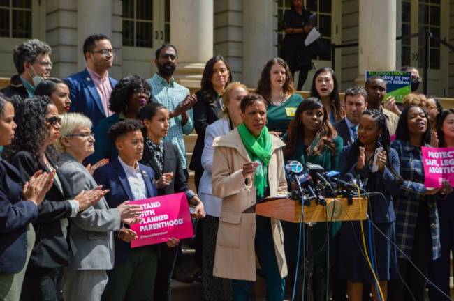 On Tuesday morning, City Council members — led by Speaker Adrienne Adams (at podium) — addressed the news with anger and frustration. Photo: Abigail Gruskin