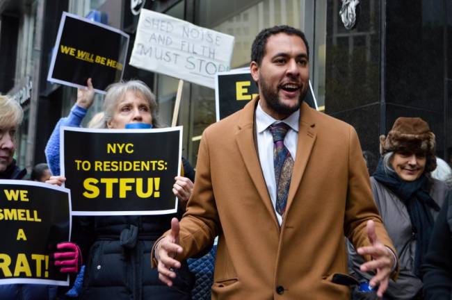 Downtown Council Member Christopher Marte joined protesters to announce that an impending vote on outdoor dining legislation would be postponed. Photo: Abigail Gruskin