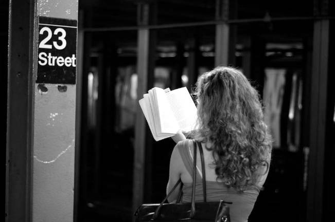 Your commute just got more interesting. The "Books on the Subway" project has left thousands of volumes on most subway lines throughout the city, and riders are encouraged to borrow them as long as they're returned to the subway. Photo: Johannes Martin, via flickr