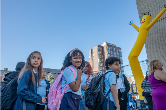 Students line up for their first day of school at John F. Hylan PS 257 Magnet School of the Performing Arts on Sept. 5, 2024.