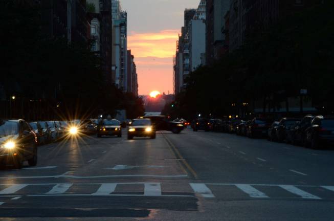 The view of Manhattanhenge from the Upper West Side. Photo: slgckgc, via flickr